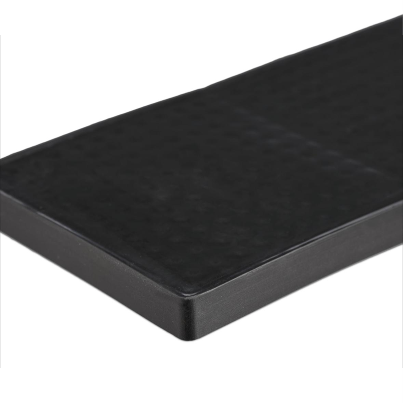 Black 60 x 8 cm PVC drain pad with raised points for bars and sinks